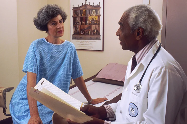 Doctor discussing health information with a patient
