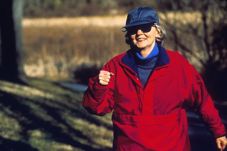 Woman power walking outdoors