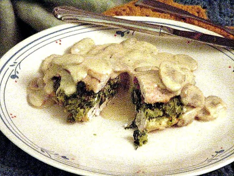 Stuffed chicken breasts served with mushroom sauce