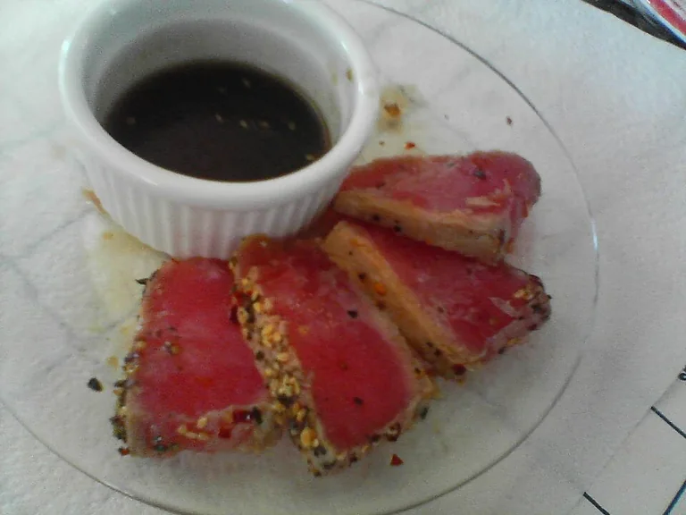 Seared ahi tuna steak on a plate